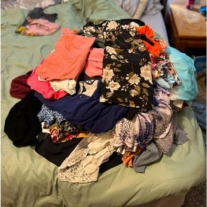 Dresses, pants, shorts, tshirts, sweaters, cardigans, etc. Sizes range from M-XL